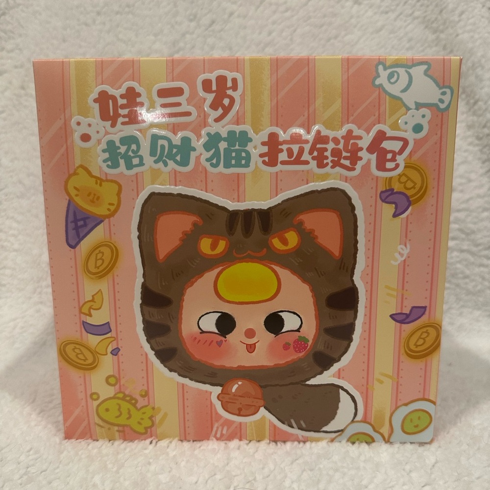 Baby Three-Fortune cat zipper bag blind box.